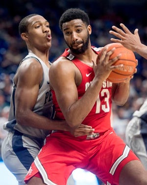 Ohio State's JaQuan Lyle tries to push around Penn State's Tony Carr during an NCAA college game Tuesday, Feb. 28, 2017, in State College, Pa. (Abby Drey/Centre Daily Times via AP)