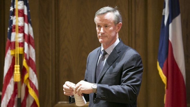 Bill McRaven, chancellor of the University of Texas System, walks away from the podium after speaking at a news conference at Ashbel Smith Hall on Wednesday to announce his decision to not develop a new campus in Houston.