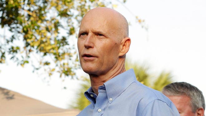 Gov. Rick Scott held a 46 percent job-approval rating in a survey the University of North Florida released Thursday morning. (AP Photo/Chris O’Meara)