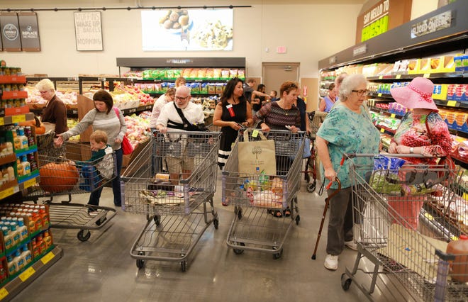 Customers work their way through an Aldi in Gainesville, Fla., in this October 2016 file photo. A new Aldi is opening on Spartanburg's west side later this month. [PHOTO: GATEHOUSE MEDIA]