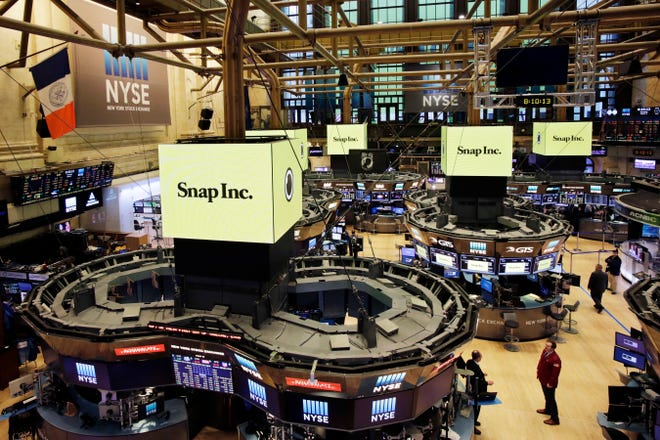 The New York Stock Exchange is prepared for the IPO of Snap Inc., Thursday, March 2, 2017. The company behind the popular messaging app Snapchat is expected to start trading Thursday after a better-than-expected stock offering. (AP Photo/Mark Lennihan)