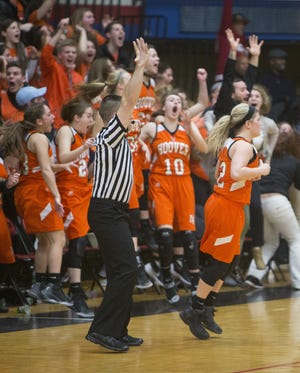 Hoover's Maddie Blyer (12) hits a three point shot in the final seconds to beat GlenOak 44-43 in the D1 District final Thursday, March 2, 2017. (CantonRep.com / Bob Rossiter)