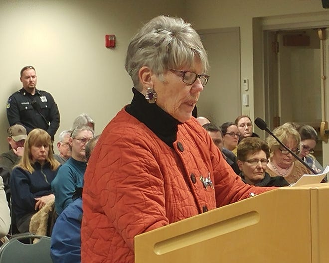 Dudley resident Mary Sansoucy, representing a group of abutters, reads a letter Thursday at the Zoning Board of Appeals meeting, detailing conditions the residents wanted attached to the special permit for a Muslim cemetery. [Photo/Debbie LaPlaca]