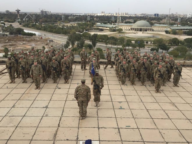 Paratroopers of the 1st Battalion, 325th Airborne Infantry Regiment, 2nd Brigade Combat Team, 82nd Airborne Division, hold a ceremony to don 82nd Airborne Division "combat patches" in Baghdad, Iraq, on Jan. 30, 2017. The 2nd Brigade is currently deployed in support of Operation Inherent Resolve, the coalition mission to defeat the Islamic State in Iraq and Syria. [U.S. Army Photo by Staff Sgt. Jason Hull]