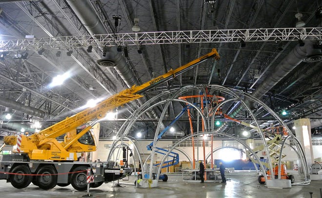One of the main exhibits at the 2017 Philadelphia Flower Show, the Ecodome, begins to take shape as workers assemble the steel skeleton on Thursday, March 2, 2017 at the Pennsylvania Convention Center in Philadelphia.