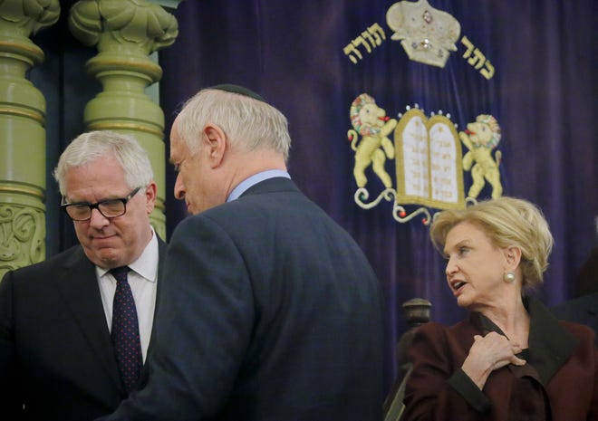 Jonathan Miller, left, NYPD deputy commissioner of Intelligence and Counterterrorism; Malcolm Hoenlein, center, executive vice-chair of Conference of Presidents of Major Jewish Organizations, and Congresswoman Carolyn Maloney, right, member of Congress' bipartisan task force combating anti-Semitism, confer after holding a news conference to address bomb treats against Jewish organizations and vandalism at Jewish cemeteries, Friday March 3, 2017, at the Park East Synagogue in New York. (AP Photo/Bebeto Matthews)