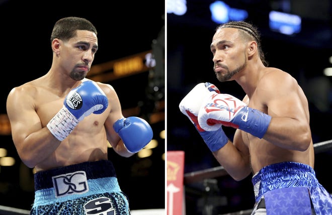 WBC champion Danny Garcia, left, faces WBA titleholder Keith Thurman in Saturday night's welterweight unification fight at the Barclays Center in Brooklyn. [The Associated Press]