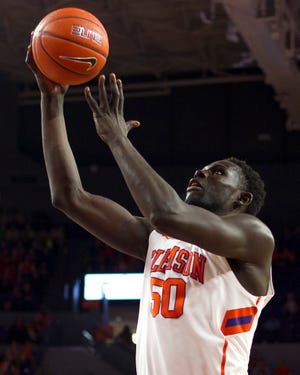 Clemson center Sidy Djitte puts in a layup during the second half os Saturday's game against Boston College. [JOSHUA S. KELLY/USA Today Sports]