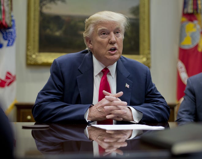 In this Feb. 27, 2017, file photo, President Donald Trump speaks in the Roosevelt Room of the White House in Washington. Trump is accusing former President Barack Obama of having Trump's telephones "wire tapped" during last year's election, but Trump isn't offering any evidence or saying what prompted the allegation. THE ASSOCIATED PRESS