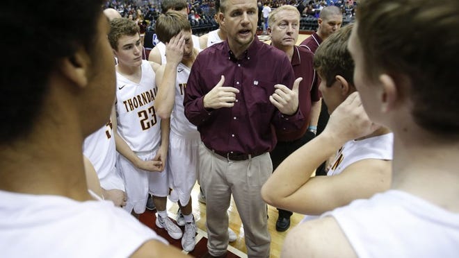 Thorndale's head coach John Kovar speaks to his team during the UIL boys 2A state semi-final at the Alamodome in San Antonio, Friday, March 11, 2016. (Stephen Spillman / for American-Statesman)
