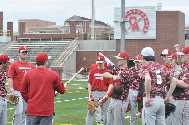 Coach Dale Werth addresses his Canandaigua Academy baseball team on the first day of practice Monday afternoon. [Bob Chavez/Messenger Post Media]