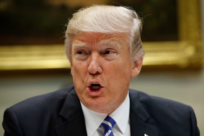 President Donald Trump’s revised travel ban will temporarily halt entry to the U.S. for people from six Muslim-majority nations who are seeking new visas, allowing those with current visas to travel freely, according to a fact sheet obtained by The Associated Press. (AP Photo/Evan Vucci, File)