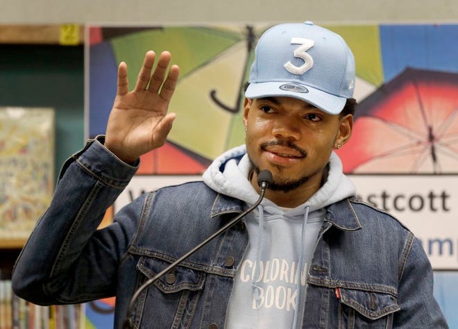 Chance The Rapper announces a gift of $1 million to the Chicago Public School Foundation during a news conference at the Westcott Elementary School, Monday, in Chicago. The Grammy-winning artist is calling on Illinois Gov. Bruce Rauner to use executive powers to better fund Chicago Public Schools. (AP Photo/Charles Rex Arbogast)