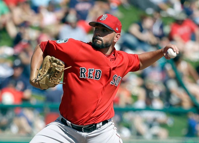 Boston Red Sox relief pitcher Robby Scott throws against the Atlanta Braves in the fourth inning in a spring training baseball game, Friday, March 3, 2017, in Kissimmee, Fla.