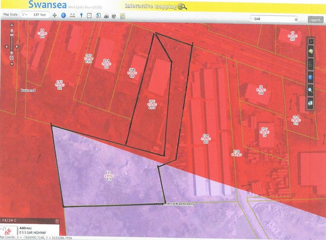 Under proposed rezoning, the .7-acre parcel in red that's zoned Business B would be zoned manufacturing like the 2.91 acres in purple. Frontage at 610 GAR Highway also shows the Suzuki dealership building.