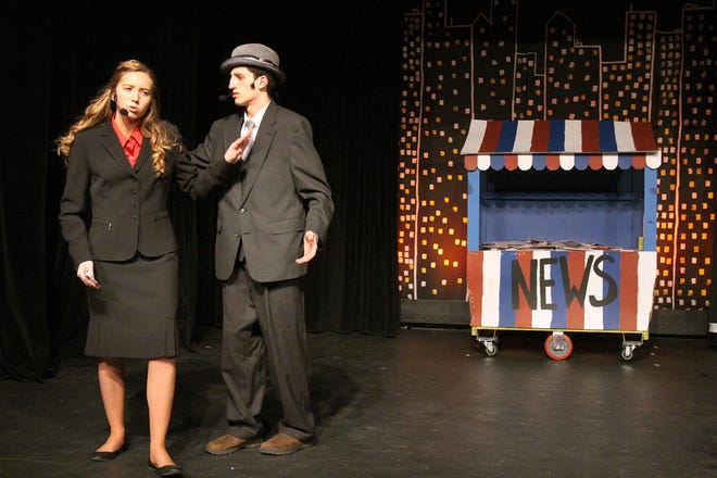 Kiersten Koch (left) and Michael Giaimo rehearse a scene from the musical "Guys and Dolls" on Tuesday, March 7, 2017, at Aquin High School in Freeport. The musical will be performed Friday, Saturday and Sunday in the Aquin Auditorium. [JANE LETHLEAN/THE JOURNAL-STANDARD CORRESPONDENT]