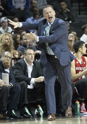 Mark Gottfried's tenure as N.C. State's head coach ended with a pair of losses to Clemson: 78-74 on March 1 at Clemson and 75-61 in Tuesday's opening game of the ACC tournament in Brooklyn, N.Y. Gottfried's record in six seasons at NCSU was 123-86, and this year's team finished 15-17. [AP Photo/Mary Altaffer]