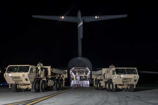 In this photo provided by U.S. Forces Korea, trucks carrying U.S. missile launchers and other equipment needed to set up the Terminal High Altitude Area Defense (THAAD) missile defense system arrive at the Osan air base in Pyeongtaek, South Korea, Monday, March 6, 2017. The U.S. military has begun moving equipment for the controversial missile defense system to ally South Korea. The announcement Tuesday by the U.S. military comes a day after North Korea test-launched four ballistic missiles into the ocean near Japan. (U.S. Force Korea via AP)