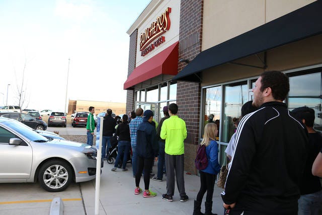 The line at Pancheros in Grimes wrapped around the building on Tuesday. Pancheros in Grimes celebrated its 25th Iowa location with $1 burritos on Tuesday. PHOTO BY CLINT COLE/DALLAS COUNTY NEWS