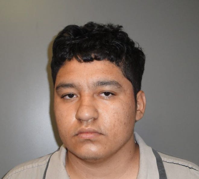This undated photo provided by the Franklin County Sheriff's Office shows Oliver Funes Machada. A federal official says the 18-year-old man accused of decapitating his mother was in the country illegally. The suspect was charged with first-degree murder Monday, March 6, 2017, after authorities say he called 911 to say he had killed his mother. He is being transferred to Central Prison in Raleigh, and his next court appearance is scheduled for March 14. (Tanya Creech/Franklin County Sheriff's Office via AP)