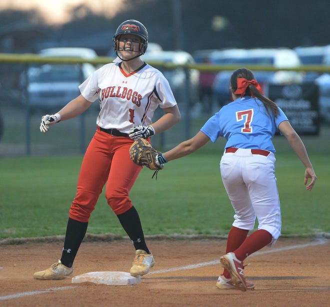 Boiling Springs' Shelbey Griffin (1) cruises into third base standing up as J.L Mann's Mackenzie Haver (7) is late with the tag during Thusday's game at Boiling Springs. [JOHN BYRUM/Spartanburg Herald-Journal]