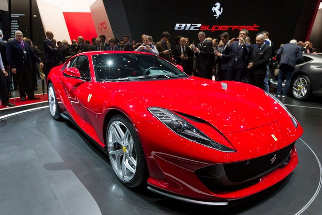 The New Ferrari 812 Superfast has a top speed of 211 mph, goes 0 to 62 in 2.9 seconds and is the "most powerful and fastest" car in the famed brand's history. [CYRIL ZINGARO / KEYSTONE]