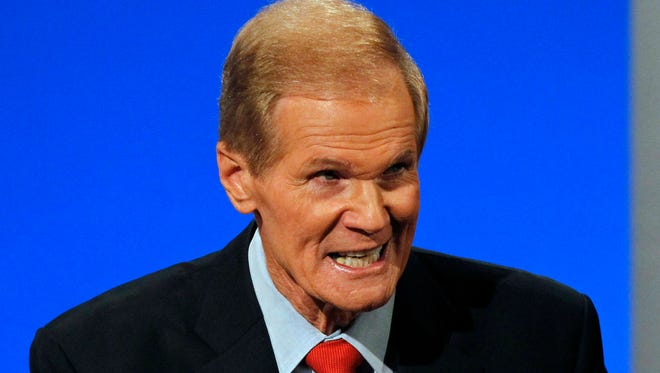 U.S. Sen. Bill Nelson, D-Fla., debating an opponent in his 2012 re-election campaign (AP Photo/Alan Diaz)
