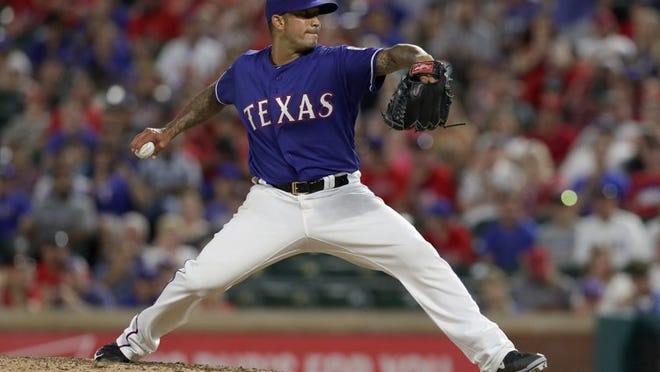 Matt Bush made his major league debut with the Texas Rangers last season after serving 3½ years in prison. TOM PENNINGTON/GETTY IMAGES