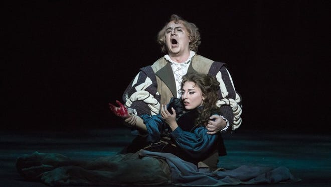 Michael Chioldi as Rigoletto and Andrea Carroll as Gilda in a scene Friday from Palm Beach Opera’s “Rigoletto.” Photo by Bruce Bennett, courtesy of Palm Beach Opera