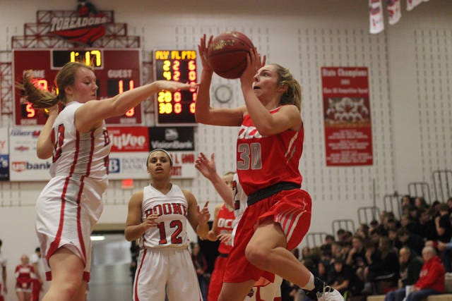 Rachel Lowary goes up for a layup against Boone earlier this season. Lowary was chosen as an LHC Second Team All-Conference member. PHOTO BY MATTHEW DEWITT/BOONE NEWS-REPUBLICAN