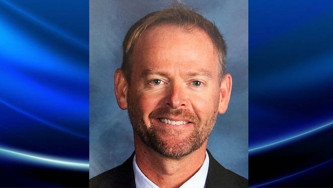 ismissed as McIntosh Academy principal two weeks ago, Barry Lollis is back on payroll in board office. (Photo provided)