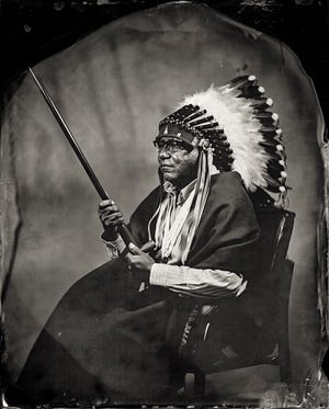 This is an archival pigment print from wet plate collodion scan titled Gordon L. Yellowman, Citizen of Cheyenne & Arapaho Tribes (2016). [Image provided by Will Wilson]