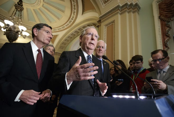 Senate Majority Leader Mitch McConnell, R-Ky., joined by, from left, Sen. John Barrasso, R-Wyo., Sen. Roy Blunt, R-Mo., and Majority Whip John Cornyn, R-Texas, speaks with reporters at the Capitol in Washington, Tuesday, March, 14, 2017. The White House and Republican leaders in Congress are scrambling to shore up support for their health care bill after findings from the Congressional Budget Office estimated that 14 million people would lose insurance coverage in the first year alone under the GOP replacement for Obamacare. THE ASSOCIATED PRESS