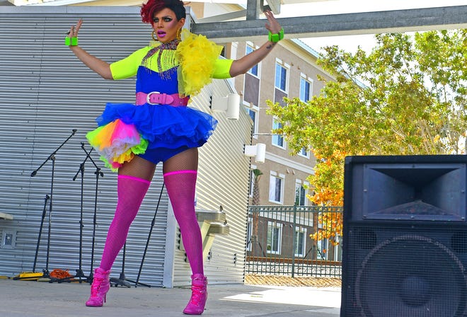 Drag Queen Calypso Monroe of Miami entertains the crowd during the Manatee County Pride Festival held at Bradenton's Riverwalk. [Herald-Tribune archive]