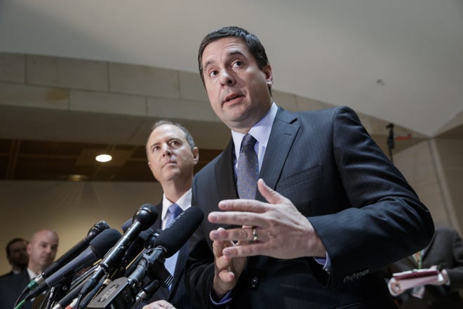 House Intelligence Committee Chairman Rep. Devin Nunes, R-Calif., right, accompanied by the committee's ranking member, Rep. Adam Schiff, D-Calif., talks to reporters, on Capitol Hill in Washington, Wednesday, March, 15, 2017, about their investigation of Russian influence on the American presidential election. Both lawmakers said they have no evidence to back up President Trump's claim that former President Barack Obama wiretapped Trump Plaza during the 2016 campaign. (AP Photo/J. Scott Applewhite)