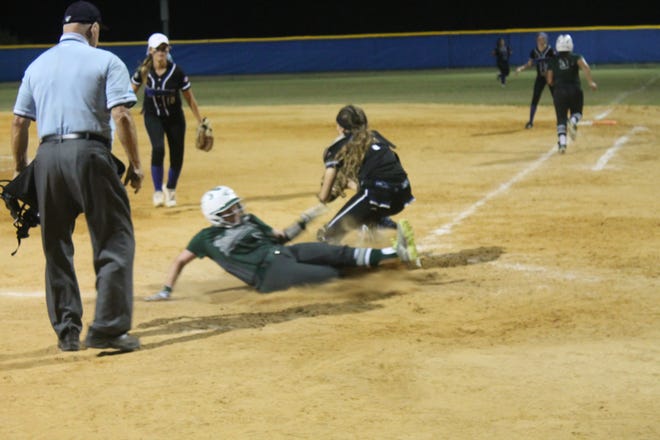Juliana Savone of FPC slides home as Matanzas's Emma Ford awaits the throw. FPC beat Matanzas 4-0 Friday in the annual rivalry game. [NEWS-TRIBUNE/ANDY MIKULA]