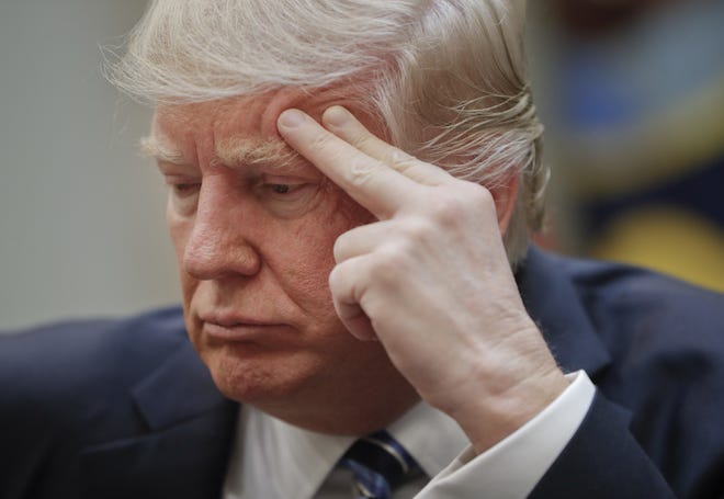 President Donald Trump listens during a meeting on healthcare in the Roosevelt Room of the White House in Washington, Monday, March 13, 2017. THE ASSOCIATED PRESS