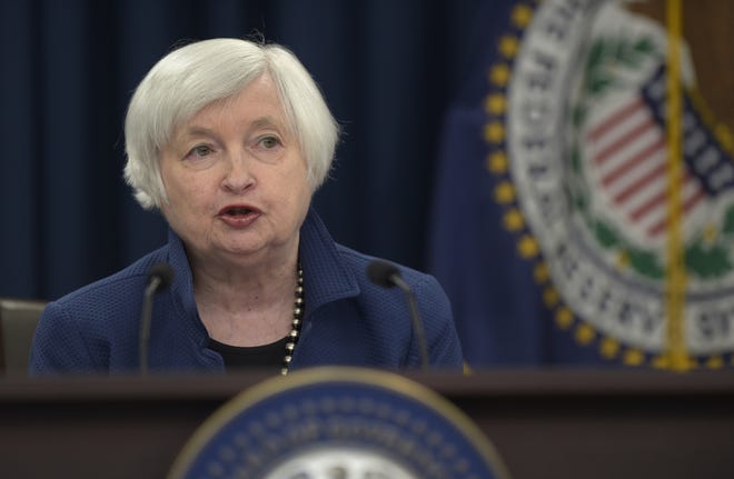 Federal Reserve Chair Janet Yellen speaks Wednesday during a news conference in Washington about the economy and central bank decision to raise a key interest rate. [THE ASSOCIATED PRESS / SUSAN WALSH]