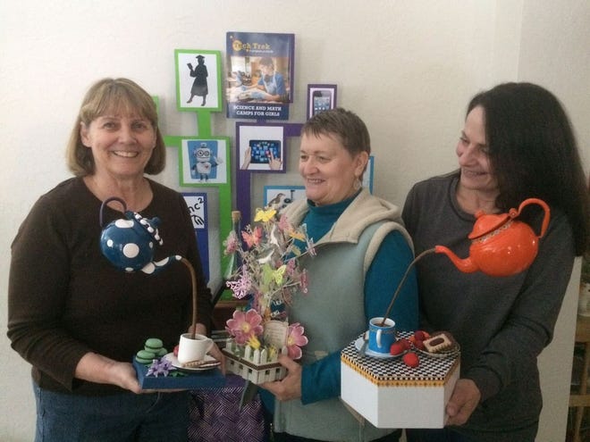 Pictured above are Pat Peterson, chairperson for the tea, Ellen Noble, and Jean Bicocca, with the hand-crafted centerpieces to serve as table decorations.