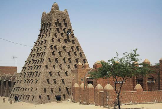 Timbuktu (also known as Tinbuktu, Timbuctoo and Timbuktoo, Tombouctou and Tumbutu) is a historical and still-inhabited city in the West African nation of Mali, situated 12 miles north of the River Niger on the southern edge of the Sahara.