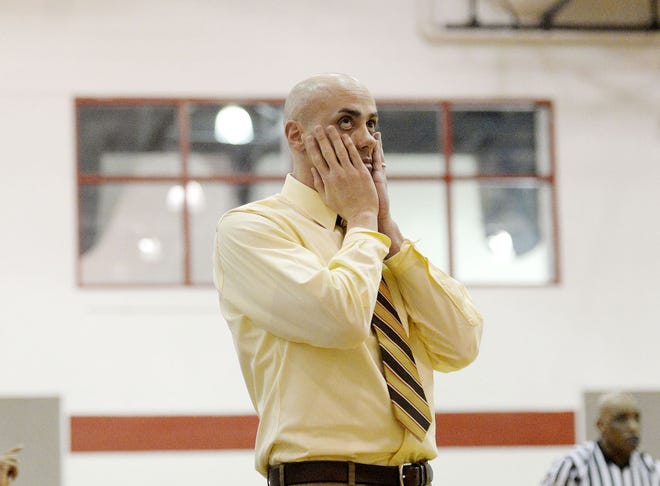 Beaver Falls' coach Doug Biega looks up at the clock during the Tigers' WPIAL quarterfinal win against Indiana in February. The Tigers fell to Strong Vincent on Thursday, the final game for Biega, who announced his retirement mid-season.