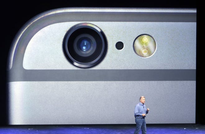 Phil Schiller, Apple's senior vice president of worldwide product marketing, discusses the camera features on the new iPhone 6 and iPhone 6 plus on Sept. 9, 2014.