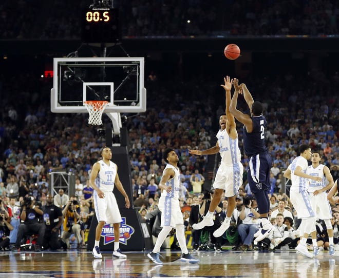 (File) In this April 4, 2016, file photo, Villanova's Kris Jenkins makes the game-winning three-point shot during the second half of the NCAA Final Four tournament college basketball championship game against North Carolina, in Houston. Top-seeded Villanova faces No. 8 seed Wisconsin in the second round of the East region on Saturday, March 18, 2017.