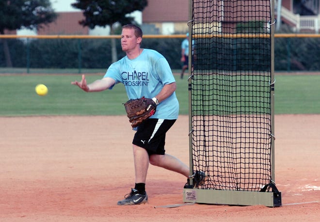 Joe Feltner has played in the city softball leagues for several years. Pictured here he was playing in the Men's Church Softball League. [FILE PHOTO]