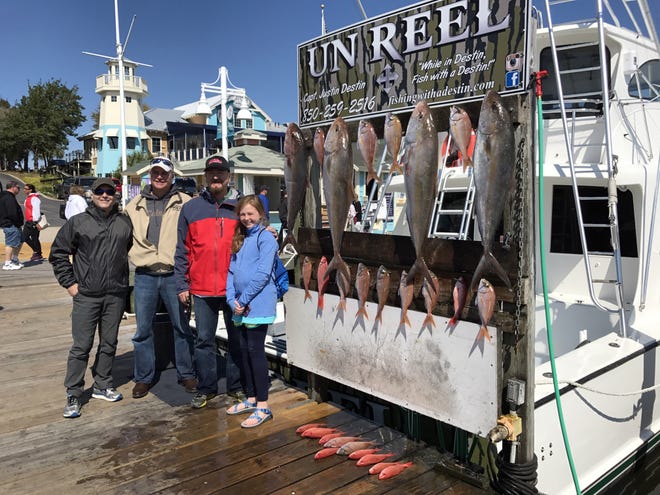 Mississippi anglers on the Un Reel with Capt. Justin Destin pulled in a good catch of amberjack, along with mingo and white snapper. [TINA HARBUCK/THE LOG]