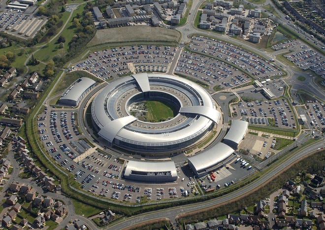 This is an undated handout file photo issued by GCHQ of the Government Communication Headquarters building in Cheltenham. White House spokesman Sean Spicer on Thursday March 16, 2017 cited Fox News analyst Andrew Napolitano, who suggested that the British electronic surveillance agency GCHQ had helped former President Barack Obama spy on Trump before last year's presidential election. GCHQ took the unusual step of releasing a statement calling the claims "nonsense." THE ASSOCIATED PRESS