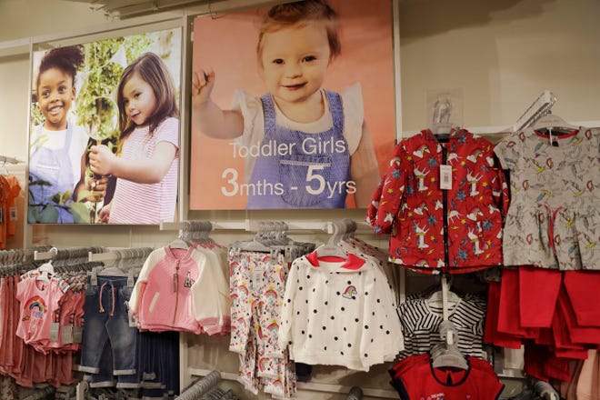 An image of Down syndrome toddler Lily Beddall, who is featuring as a model for British fashion and homeware retailer Matalan, is displayed in a Matalan store on Oxford Street in London, Friday, March 17, 2017. (AP Photo/Matt Dunham)