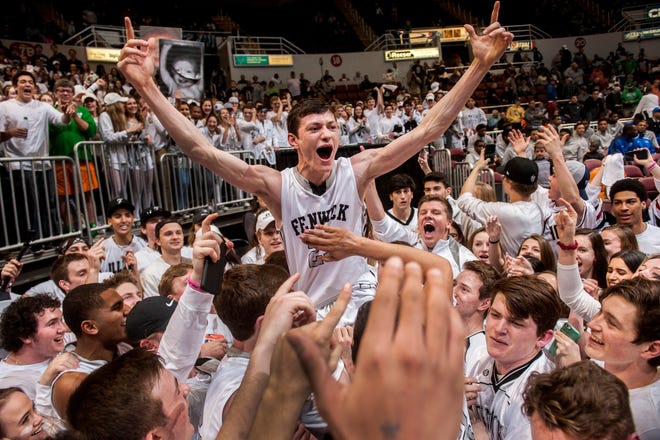 FRED ZWICKY/JOURNAL STAR

Fenwick guard Connor Wilson gets hoisted up by the fans in the stands as Oak Park Fenwick beats Bloomington 67-52 in their Class 3A semifinal game at the Peoria Civic Center Friday. Fenwick will head into the state title game Saturday.