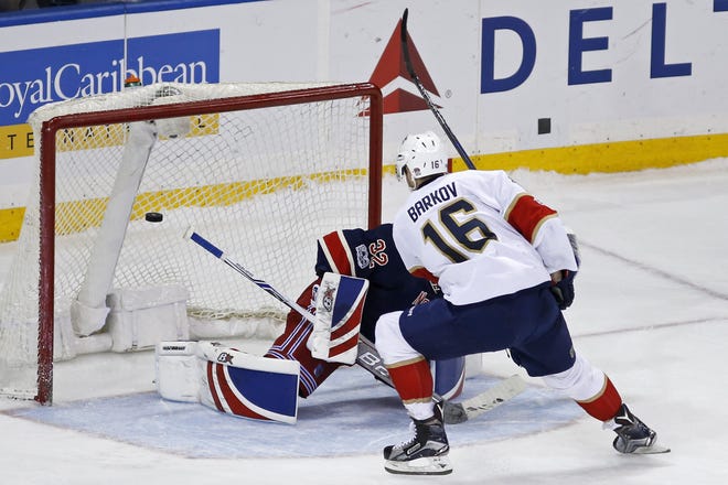 Florida Panthers' Aleksander Barkov beats Rangers goalie Antti Raanta in the shootout. [The Associated Press]