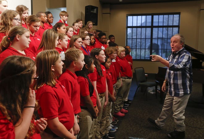 Members of the Alabama Choir School rehearse under the direction of Doff Procter on March 9 in Christ Episcopal Church in Tuscaloosa. The choir is preparing for a performance in Carnegie Hall on Sunday. [Staff Photo/Gary Cosby Jr.]
